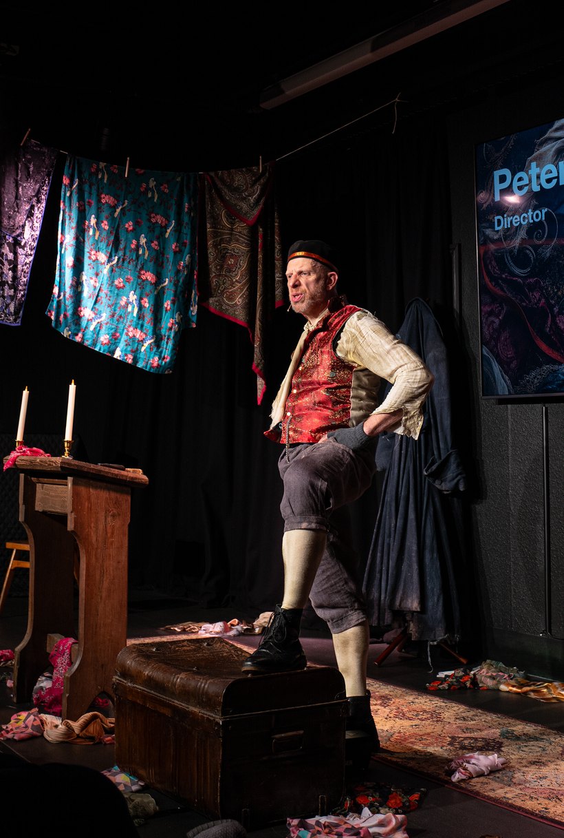 Steve Furst as Fagin in waistcoat, mid-performance