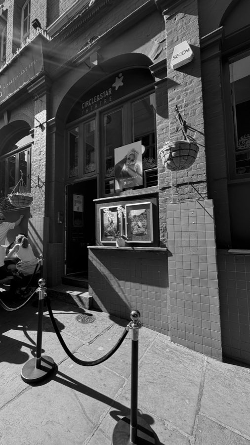 The Circle & Star frontage on Heath Street, display cases carrying images from the show